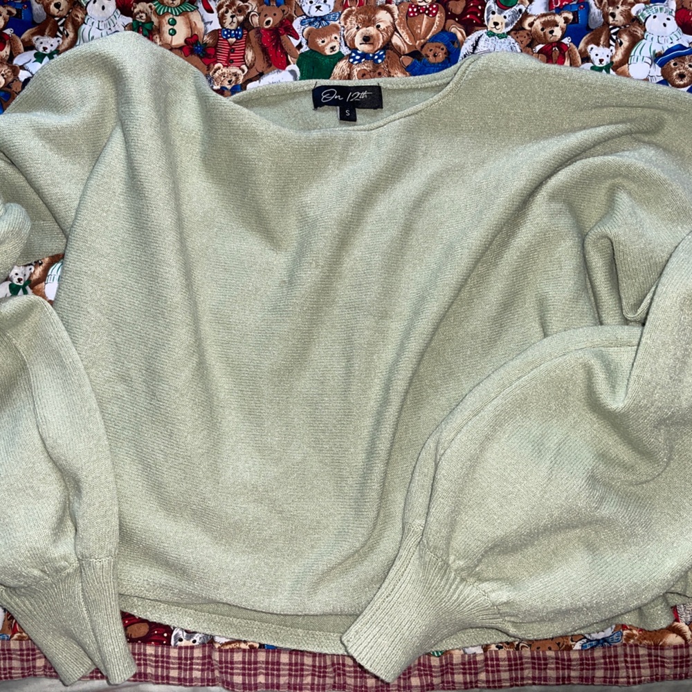 Super cute sage green long sleeve , trendy and keeps me warm but not too warm!